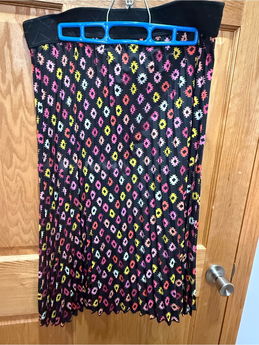 LuLaRoe Black Pleated Midi Skirt with Pink, Yellow, Orange & Cream Motif